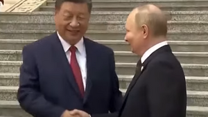 Putin i Xi ogłaszają w Pekinie plany wzmocnienia więzi wojskowych